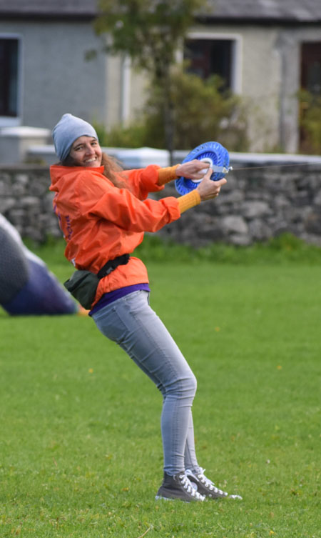 a girl launching a kite